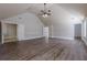 Main bedroom with hardwood floors, vaulted ceiling and multiple closets at 5590 Vickery Cir, Cumming, GA 30040