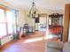 Bright dining room with hardwood floors and a chandelier at 730 Ponderosa Ct, Fayetteville, GA 30214