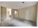 Large bedroom with view of the hallway entry, office space, and ensuite at 104 Woodhaven Way, Alpharetta, GA 30009