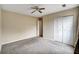 Functional bedroom features a ceiling fan and carpet flooring; customizable space at 104 Woodhaven Way, Alpharetta, GA 30009