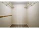 A walk-in closet with shelving for optimal organization and storage space at 104 Woodhaven Way, Alpharetta, GA 30009