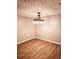 Simple dining room with chandelier and wood-look floors at 2302 Waldrop Pl, Decatur, GA 30034