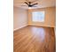 Spacious living room featuring wood-look floors and a ceiling fan at 2302 Waldrop Pl, Decatur, GA 30034