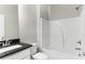 Clean bathroom with granite countertop and tub shower combo at 505 Paces Dr, Lithia Springs, GA 30122