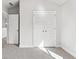 Large bedroom closet with double doors and neutral finish at 505 Paces Dr, Lithia Springs, GA 30122