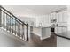 Modern kitchen with white cabinets, granite countertops, and stainless steel appliances at 505 Paces Dr, Lithia Springs, GA 30122