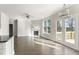 Spacious living room with hardwood floors, fireplace, and access to deck at 505 Paces Dr, Lithia Springs, GA 30122