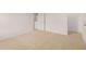 Spacious bedroom with neutral carpeting and closet at 175 Amberjack Trail, Covington, GA 30016