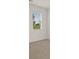 Bright bedroom with window and neutral carpet at 205 Amberjack Trail, Covington, GA 30016