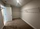 Walk-in closet with carpeted floor and wire shelving at 2180 Highridge Point Dr, Lithia Springs, GA 30122