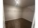 Walk-in closet featuring carpeted floor and wire shelving at 2180 Highridge Point Dr, Lithia Springs, GA 30122