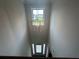 Foyer with lantern-style light fixture, a view of the front door and exterior at 2180 Highridge Point Dr, Lithia Springs, GA 30122