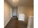 Upstairs hallway with carpeted floor and neutral paint at 2180 Highridge Point Dr, Lithia Springs, GA 30122