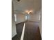 Expansive main bedroom with neutral carpet and trim, large windows, and ample space at 2180 Highridge Point Dr, Lithia Springs, GA 30122