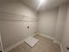 Storage area featuring vinyl floor, wire racks and utility hookups at 2180 Highridge Point Dr, Lithia Springs, GA 30122