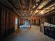 Unfinished basement with exposed framing and a concrete floor at 2368 Misty Ivy Ct, Buford, GA 30519