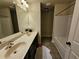 Bathroom with double sinks and a shower/tub combo at 2368 Misty Ivy Ct, Buford, GA 30519