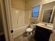 Clean bathroom with tub/shower and single vanity at 2368 Misty Ivy Ct, Buford, GA 30519