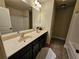 Bathroom with double sinks and a shower/tub combo at 2368 Misty Ivy Ct, Buford, GA 30519