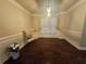 Formal dining room with hardwood floors and wainscoting at 2368 Misty Ivy Ct, Buford, GA 30519