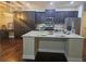 Modern kitchen with granite island and stainless steel appliances at 2368 Misty Ivy Ct, Buford, GA 30519