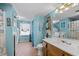 Clean bathroom with shower/tub combo, laundry, and linen storage at 2930 Dallas Nw St, Kennesaw, GA 30144