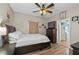 Spacious bedroom with a ceiling fan and access to the bathroom at 2930 Dallas Nw St, Kennesaw, GA 30144