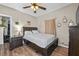 Comfortable bedroom with ceiling fan and wood flooring at 2930 Dallas Nw St, Kennesaw, GA 30144