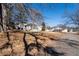 House exterior view with surrounding trees and a basketball hoop at 2930 Dallas Nw St, Kennesaw, GA 30144