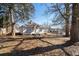 White house with a front yard and surrounding trees at 2930 Dallas Nw St, Kennesaw, GA 30144
