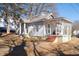 One-story house with a porch, steps, and surrounding trees at 2930 Dallas Nw St, Kennesaw, GA 30144