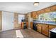 Bright kitchen with wood cabinets and updated appliances at 2930 Dallas Nw St, Kennesaw, GA 30144
