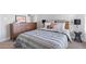Cozy bedroom with a comfortable bed and dresser at 515 Paces Dr, Lithia Springs, GA 30122