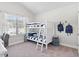 Well-lit bedroom featuring a bunk bed and window at 515 Paces Dr, Lithia Springs, GA 30122