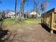 Large backyard showing the new wooden deck with an expansive lawn area perfect for outdoor activities at 1089 Avon Sw Ave, Atlanta, GA 30310