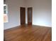Cozy bedroom featuring gleaming hardwood floors and bright natural light at 1089 Avon Sw Ave, Atlanta, GA 30310