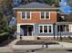 Charming two-story home with a landscaped front yard, classic architecture, and inviting entrance at 1089 Avon Sw Ave, Atlanta, GA 30310
