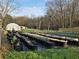 Scenic view of a farm featuring rows of potted plants and a greenhouse at 1089 Avon Sw Ave, Atlanta, GA 30310