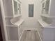 Unique hallway with built-in cabinets and drawers providing ample storage and elegant design at 1089 Avon Sw Ave, Atlanta, GA 30310