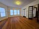 Bright and spacious living room with hardwood floors, large windows, and classic architectural details at 1089 Avon Sw Ave, Atlanta, GA 30310