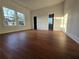 Spacious living room with hardwood floors, multiple windows, and light filled interiors at 1089 Avon Sw Ave, Atlanta, GA 30310