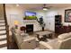 Living room with hardwood floors, fireplace, and comfortable seating at 2708 Eagles Crest Ln, Decatur, GA 30034
