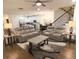 Spacious living room with hardwood floors, a large sectional sofa, and a coffee table at 2708 Eagles Crest Ln, Decatur, GA 30034