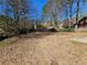 The backyard is flat and clear with a wood fence on the back of the property at 432 Independence Dr, Jonesboro, GA 30238