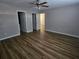 The bedroom features updated wood floors, neutral walls, and two closets at 432 Independence Dr, Jonesboro, GA 30238