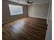 Bedroom featuring a large window and hardwood floors at 432 Independence Dr, Jonesboro, GA 30238