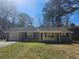 Charming single-story home with a garage and well-kept lawn at 432 Independence Dr, Jonesboro, GA 30238