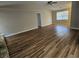 Large, open living room showcasing beautiful wood flooring and natural light at 432 Independence Dr, Jonesboro, GA 30238