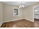 Dining room with hardwood floors and chandelier at 4222 Webb Rd, Tucker, GA 30084