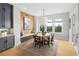 Charming breakfast nook with built-in bench seating and wood-look flooring at 6430 Pond View Dr, Cumming, GA 30028